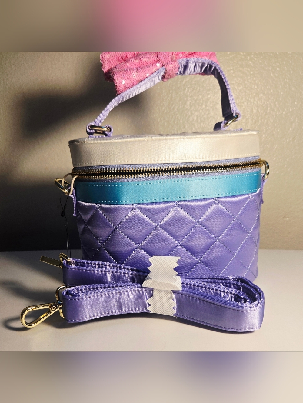 Loungefly Disney Daisy Duck 85th Anniversary Quilted Sequin Bow Crossbody Bag.
